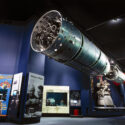 Colour photograph of the Black Arrow rocket suspended in the Science Museum Space Gallery
