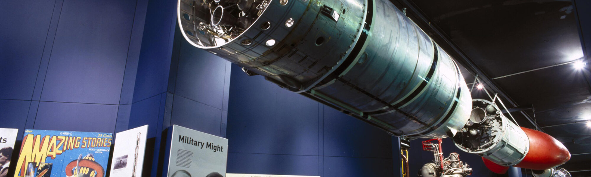 Colour photograph of the Black Arrow rocket suspended in the Science Museum Space Gallery