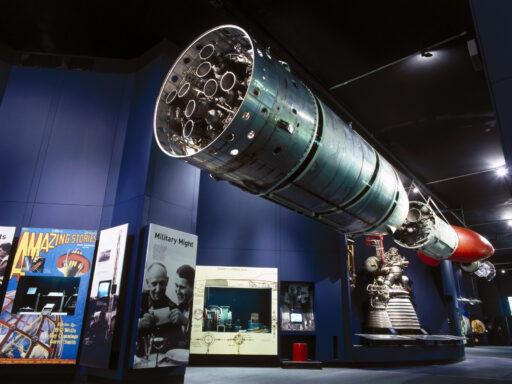 Colour photograph of the Black Arrow rocket suspended in the Science Museum Space Gallery