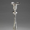 One of a pair of die struck Sheffield plate candlesticks from 1775