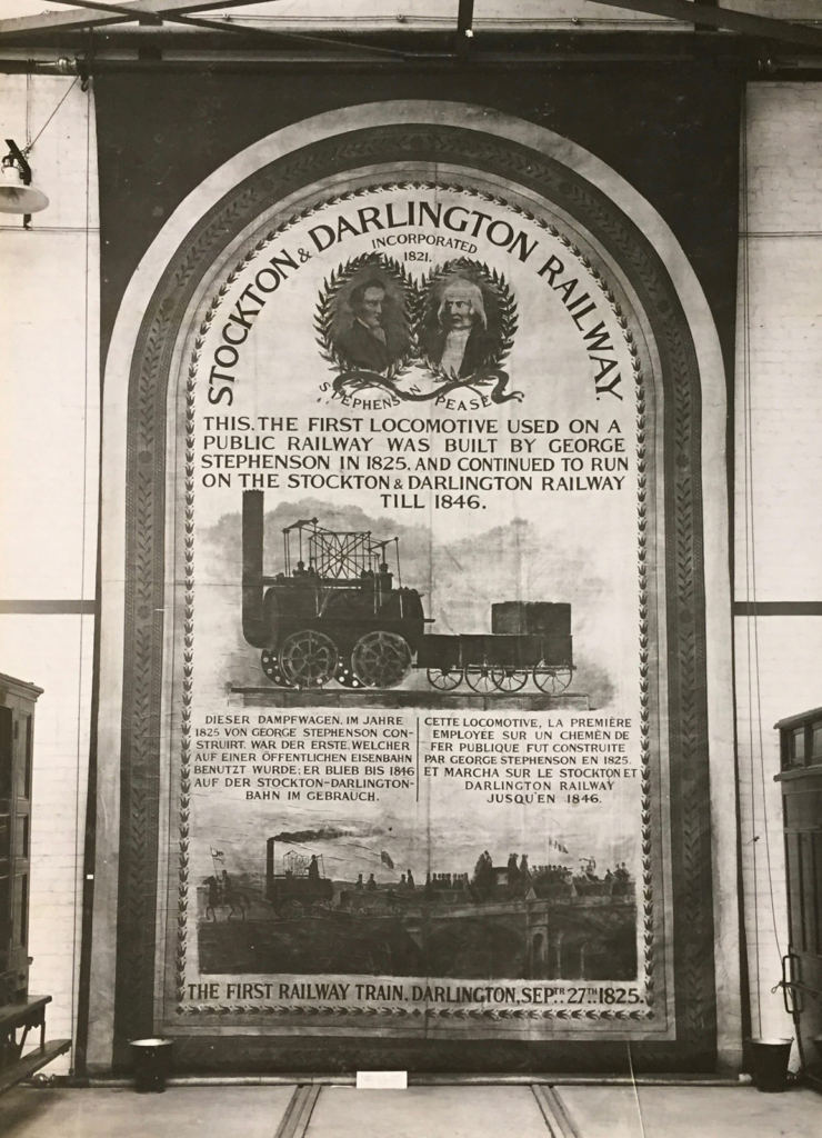 Black and white photograph of a banner for a railway centenary exhibition in 1925