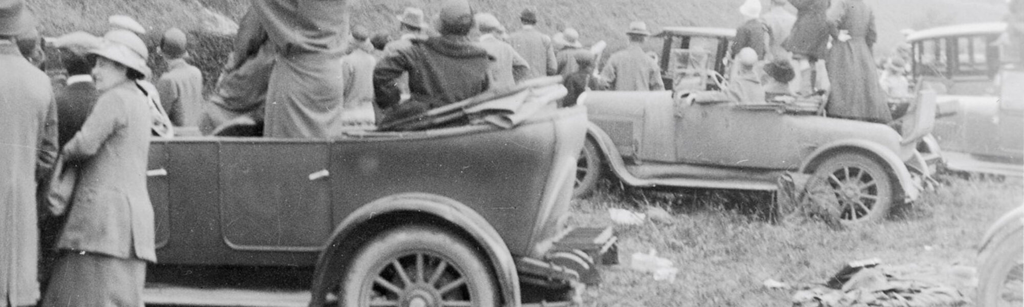 Black and white photograph of spectators at a railway centenary procession in 1925