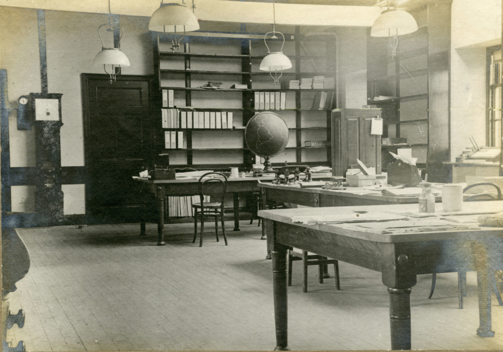 Black and white photograph from 1910 showing the office and library of Eskdalemuir Observatory
