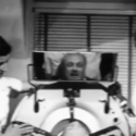 Video snapshot of Drew Pearson trying out an iron lung in 1956