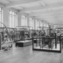 Monochrome photograph of textile machinery exhibition in 1927