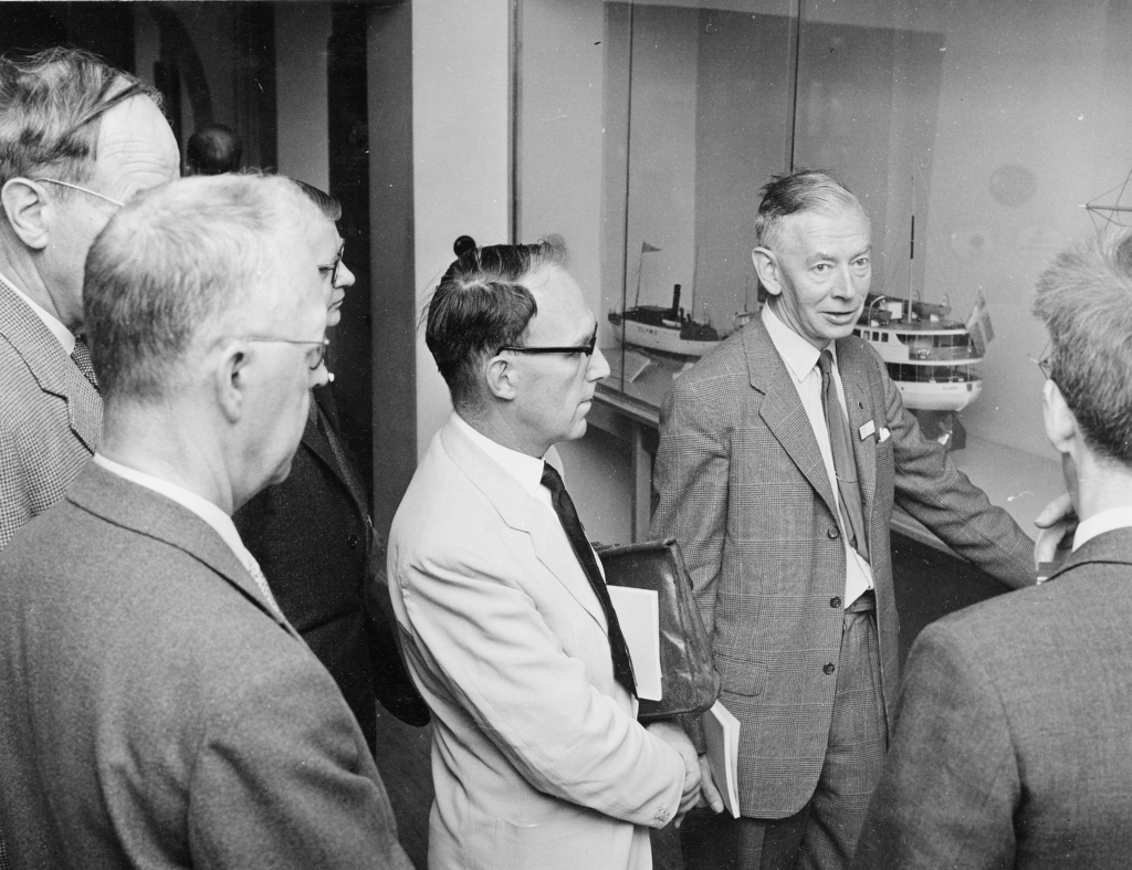 Black and white photograph of ICOM officials visiting the Swedish Postmuseum