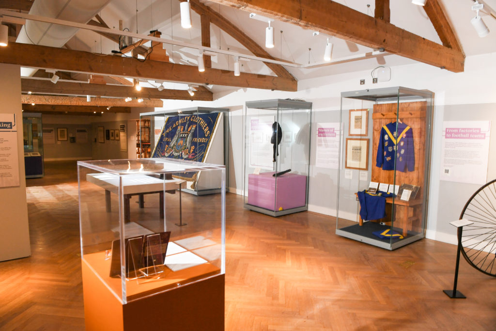 Colour photograph of a view across an exhibition, located in the Leeds City Museum