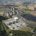 Colour aerial photograph of a Combined Cycle Gas Turbine station and a coal fired power station in rural Nottinghamshire