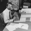 Paul Cannon running an experiment on an early computer at Cobbett Hill