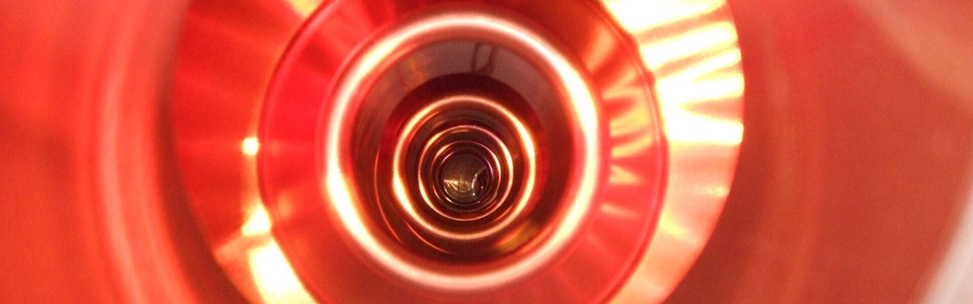 Colour photograph of an inside view of a large electron positron collider cavity