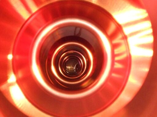 Colour photograph of an inside view of a large electron positron collider cavity