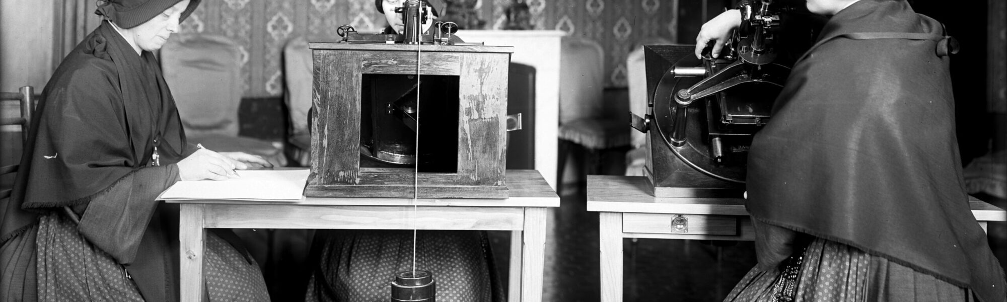 Photograph of three nuns working at the Vatican Observatory