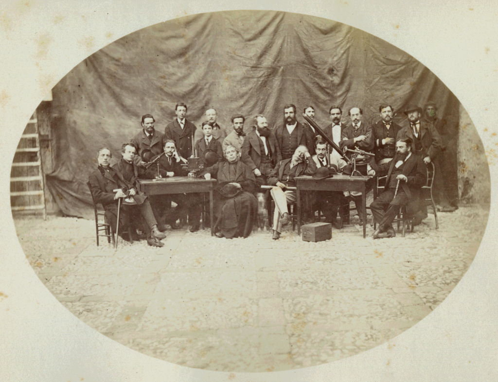 Photograph of a group of the scientists in Augusta with local authorities