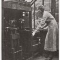 Monochrome photograph of Percy Smiths assistant Phyllis Bolté alongside one of the plant machines