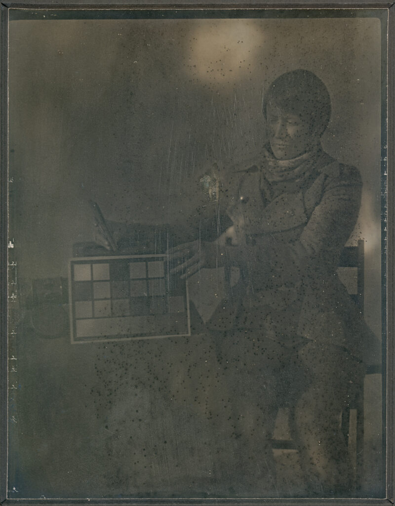 Contemporary daguerreotype image of a seated woman produced on clad silver plate