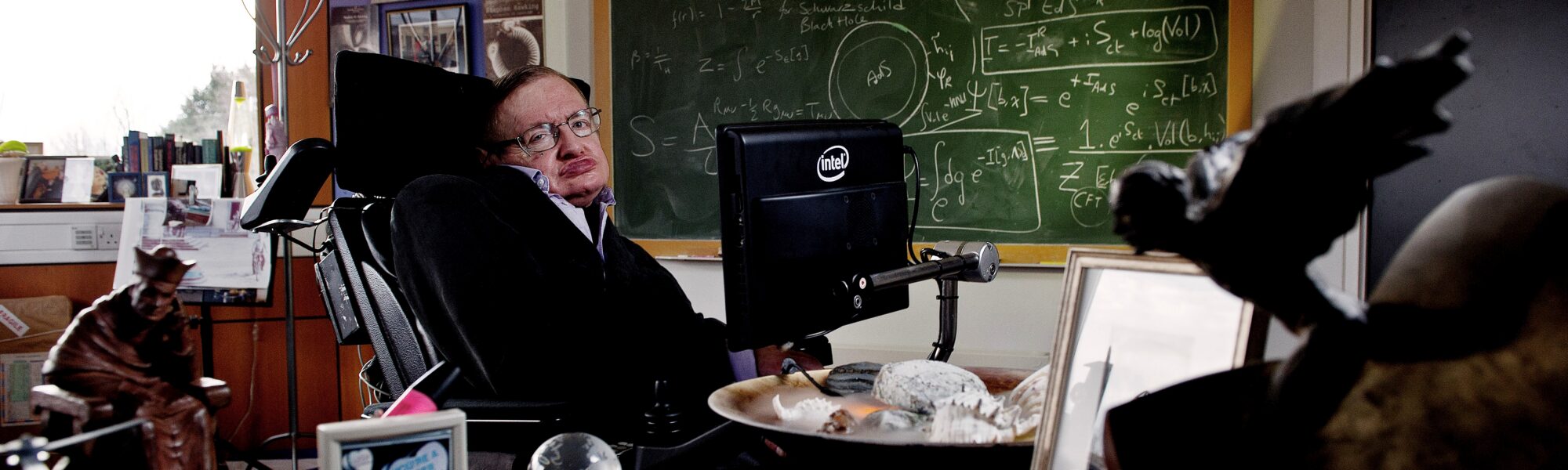 Colour photograph of Stephen Hawking in his office