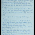 A page of a letter. The paper appears to be a light blue and the letter is written in cursive.