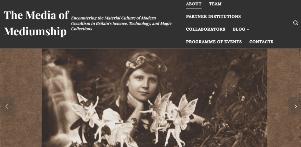 Website landing page for The Media of Mediumship project. Features a navigation bar at the top and a photograph of a young girl seeming to play with fairies as the main screen.