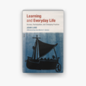 Image of a book cover featuring the silhouette of a boat against a blue background.