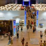 Colour photograph from high elevation of the Intermuseum conference showing a number of conference stalls