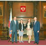 Colour photograph of HE Ambassador Yakovenko and Ian Blatchford accompanied by Head of Development Sue Fisher and Cosmonauts curator Natalia Sidlina inside the Russian Embassy