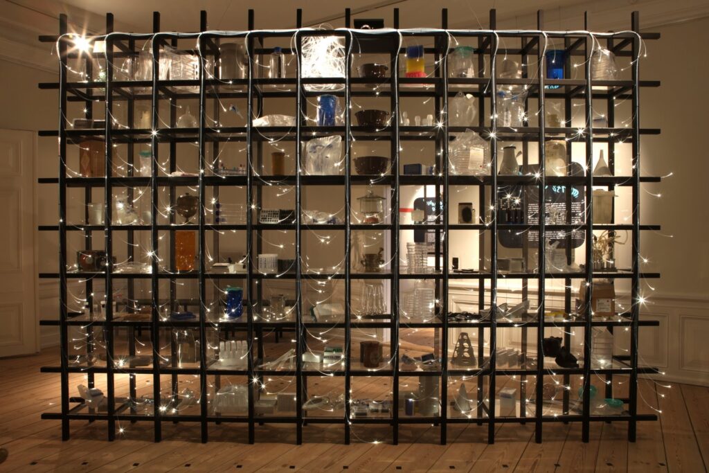 Colour photograph of an led lit display case for medical hardware