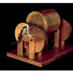 Triptych showing three of the wooden models from designs by da vinci on display in the science museum