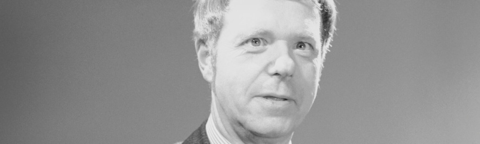 Black and white portrait photograph of Brian Bracegirdle