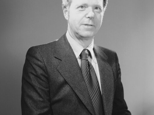 Black and white portrait photograph of Brian Bracegirdle