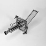 Black and white photograph of a Solar microscope accessory Cuff's second pattern comprising mounting plate with fixing screws mirror with adjustments and tube with condensing lens