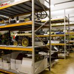 Colour photograph of museum collections in storage within shelving
