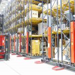 Colour photograph showing collections storage in racking within a warehouse