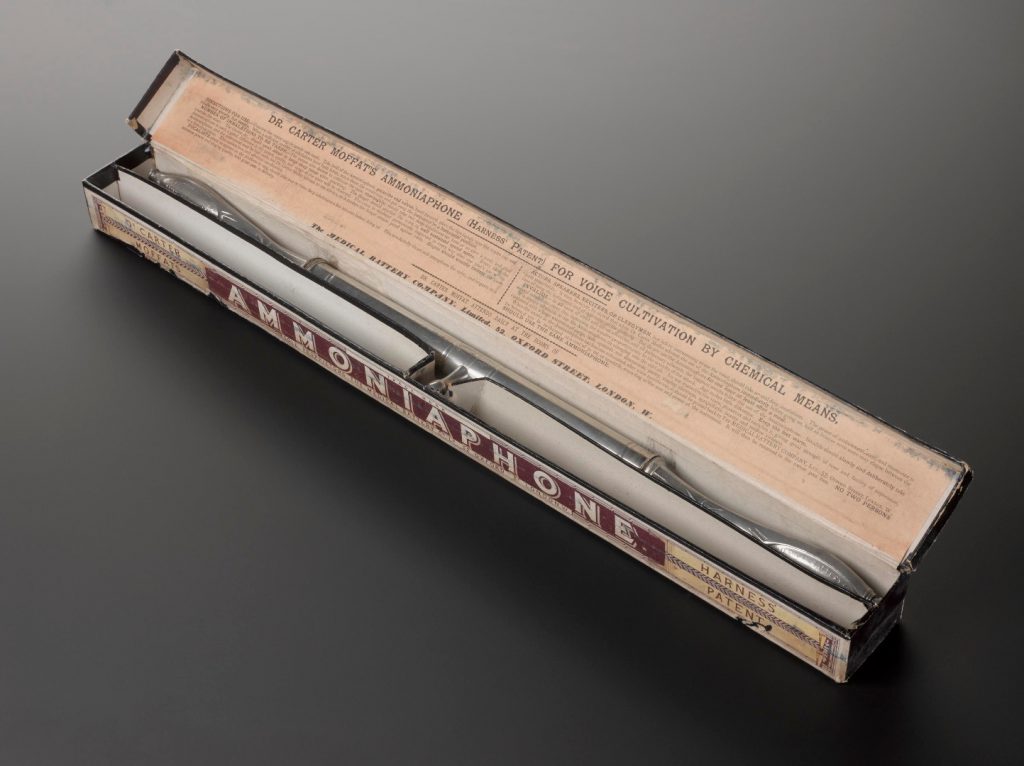 Colour photograph of the Ammoniaphone instrument inside the original box packaging