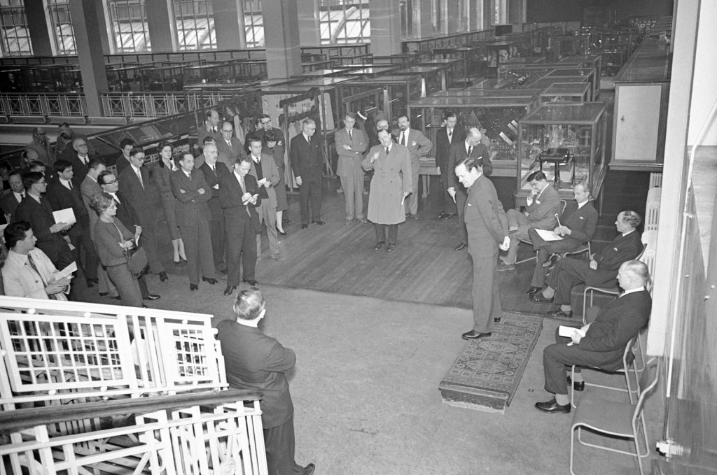 Black and white photograph from the nineteen fifties of Parliamentary Secretary Richard Thompson giving a speech at the opening ceremony of the radio guided tour