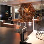 Colour photograph of a long view of the Information Age gallery showing the large Rugby Tuning Coil in the centre