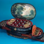 Colour photograph of an italian medicine chest from around 1560 with the lid and drawers open to show the original contents
