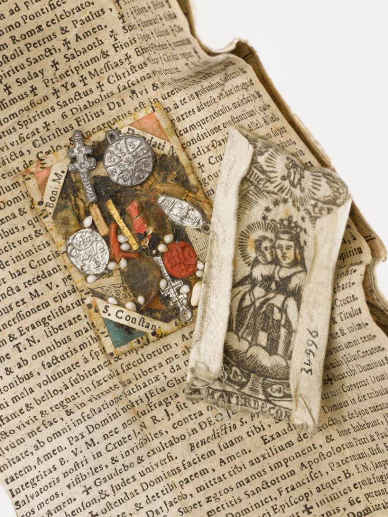 Colour photograph of a breverl composite amulet