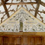 A tympana in a Tudor house depicting Destiny and Fortune