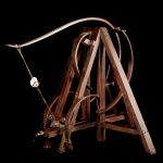 Colour photograph of a wooden model of a spring catapult