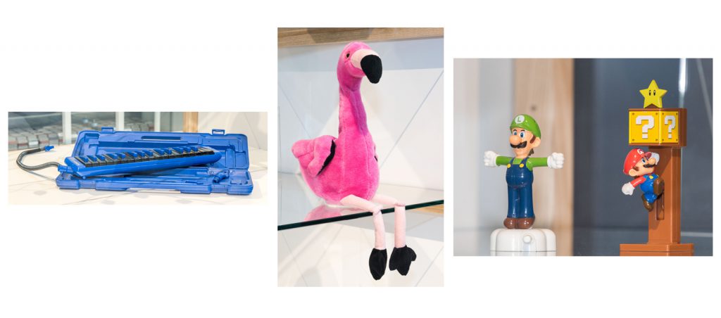 Colour photographs of a melodica instrument a stuffed flamingo toy and Super Mario figures