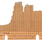 Colour photograph of an individual chart card from a 1950s three dimensional chart showing electricity demand over time