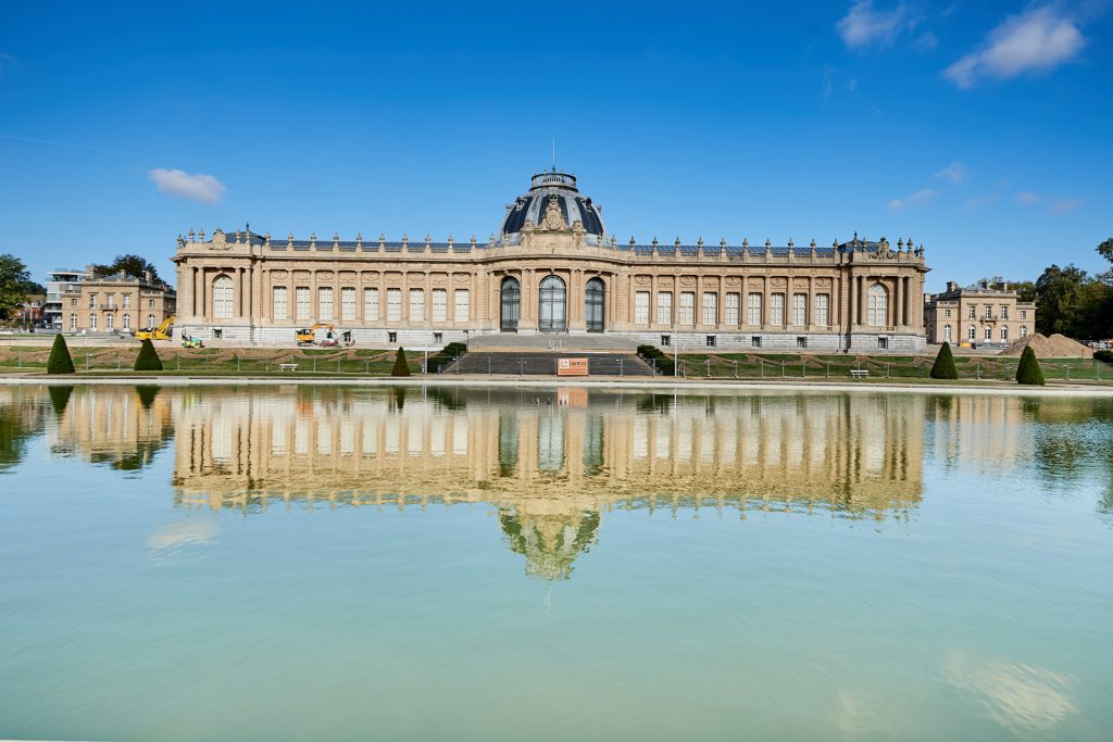 Colour photograph of a view of the Royal Museum of Central Africa from the adjacent lake