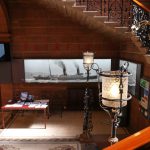 Colour photograph of the entrance chamber of Fairfield showing staircase