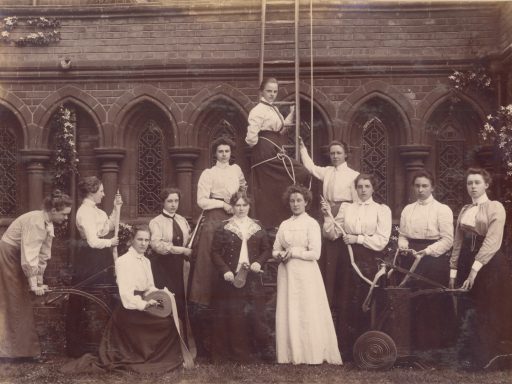 Sepia photograph of the Girton College Cambridge fire brigade featuring Hertha Ayrton from 1880