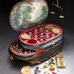 Colour photograph of an italian medicine chest from around 1560 with the lid and drawers open to show the original contents