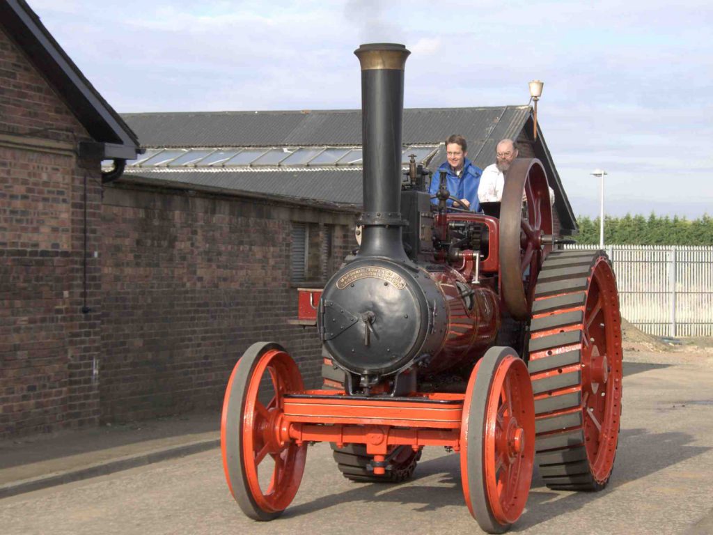 Colour photograph of a restored Marshall traction engine from 1906