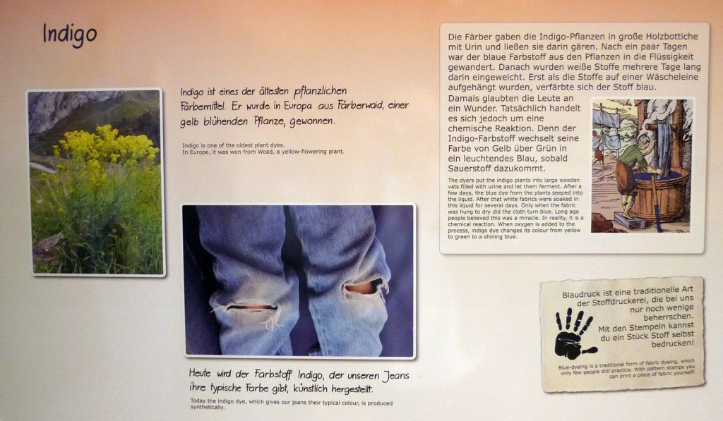 Colour photograph of an exhibition panel about the colour indigo