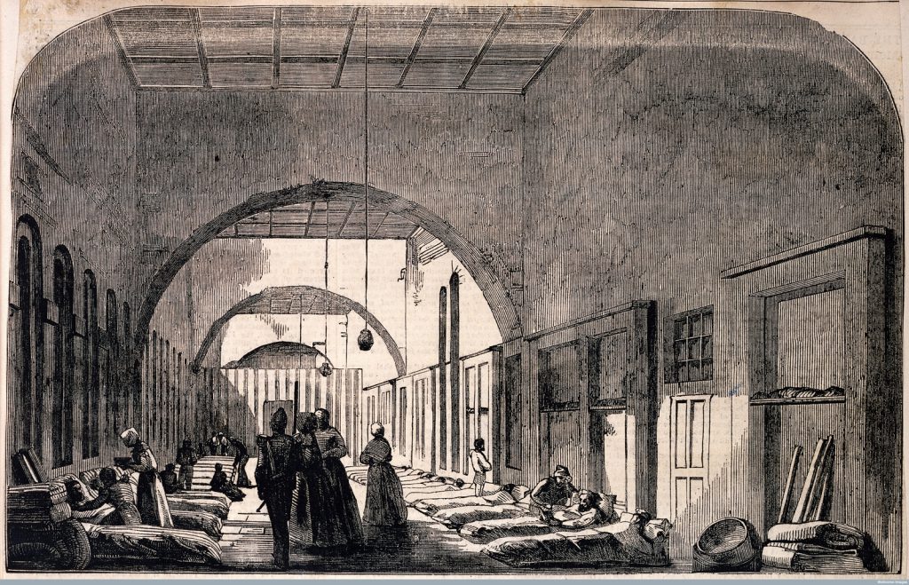 Black and white block print of a scene inside Scutari military hospital