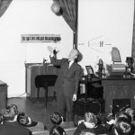 Black and white photograph of Major Wall giving a lecture demonstration to school children in 1969