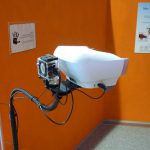 Colour photograph of a viewing eyepiece that simulates vision without colour